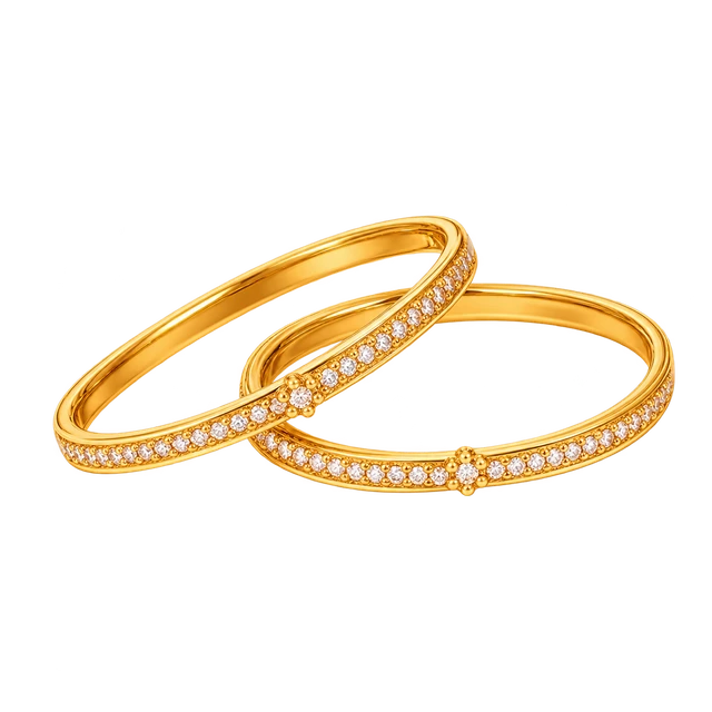 Gold bangles set with diamonds